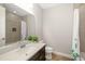Bright bathroom featuring a neutral color scheme and bath with shower curtain at 3644 Pitch Ln, Sarasota, FL 34232