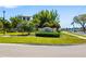 Inviting entrance sign amidst lush greenery, signaling a warm welcome to prospective homeowners at 3644 Pitch Ln, Sarasota, FL 34232
