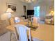 Open dining and living space, filled with natural light and comfortable furnishings at 3660 Lake Bayshore Dr # K-321, Bradenton, FL 34205