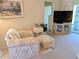 Relaxing living room features soft furnishings and a serene atmosphere at 3660 Lake Bayshore Dr # K-321, Bradenton, FL 34205