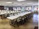 Bright, open meeting space with folding tables, chairs, and large windows for natural light at 3660 Lake Bayshore Dr # K-321, Bradenton, FL 34205