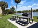 Scenic picnic area by the water with new charcoal grill at 3660 Lake Bayshore Dr # K-321, Bradenton, FL 34205