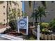 Exterior shot of Bayshore on the Lake Clubhouse Phase 2 sign with surrounding landscaping at 3660 Lake Bayshore Dr # K-321, Bradenton, FL 34205