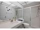 Clean bathroom with a shower and bathtub combination and large vanity mirror at 3673 Longmeadow # 18, Sarasota, FL 34235