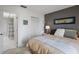 Cozy bedroom features an en-suite bathroom and is complemented by tasteful decor and ample space at 3673 Longmeadow # 18, Sarasota, FL 34235