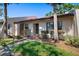 Attractive single-story home featuring a well-maintained front yard and a paved pathway leading to the front door at 3673 Longmeadow # 18, Sarasota, FL 34235