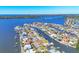 Breathtaking aerial view of waterfront homes with canal access to the bay at 4908 Arlington Rd, Palmetto, FL 34221