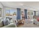 Bright living room offering an inviting atmosphere with ample natural light and relaxing views of the canal at 4908 Arlington Rd, Palmetto, FL 34221
