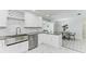 Clean kitchen featuring stainless steel appliances and granite countertops at 507 Shore Dr, Largo, FL 33771