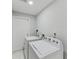 This laundry room features a washer and dryer at 507 Shore Dr, Largo, FL 33771