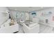 Comfortable living room featuring stylish seating, décor, and window views at 507 Shore Dr, Largo, FL 33771