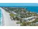 Expansive coastal aerial view of beachfront condos and the Gulf of Mexico at 5125 Gulf Of Mexico Dr # 4, Longboat Key, FL 34228