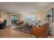 Comfortable living room with sliding doors to the exterior balcony at 5125 Gulf Of Mexico Dr # 4, Longboat Key, FL 34228