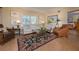 Bright living room with comfortable seating at 5125 Gulf Of Mexico Dr # 4, Longboat Key, FL 34228