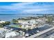 Scenic aerial view of waterfront complex with docks, surrounded by beautiful blue water and serene setting at 5325 Marina Drive # 423, Holmes Beach, FL 34217