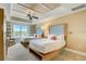 Bright and inviting bedroom featuring two beds, a ceiling fan, and an abundance of natural light at 5325 Marina Drive # 423, Holmes Beach, FL 34217