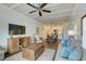The open-concept living room flows to the kitchen area, enhanced by stylish furnishings and decor at 5325 Marina Drive # 423, Holmes Beach, FL 34217