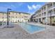 Outdoor pool with lounge chairs, perfect for relaxation and recreation in the sun at 5325 Marina Drive # 423, Holmes Beach, FL 34217