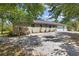 Sprawling home features a side entry 3-car garage, large back yard and mature landscaping at 5442 Kent Rd, Venice, FL 34293