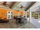 Spacious outdoor lanai featuring multiple seating and dining areas with a beautiful view of the pool at 5442 Kent Rd, Venice, FL 34293