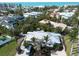 Picturesque view of coastal community with homes nestled among trees, near the beach and ocean at 5608 Holmes Blvd, Holmes Beach, FL 34217