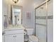 Bathroom featuring a marble sink and a standing shower at 5742 Hydrangea Cir, Sarasota, FL 34238
