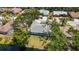 Stunning aerial view of property with mature trees and view of the water at 5810 42Nd E St, Bradenton, FL 34203