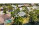 This aerial view showcases the property's lake views, landscaping, and neighborhood at 5810 42Nd E St, Bradenton, FL 34203