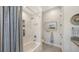 Updated bathroom featuring a shower and tub combination and modern fixtures at 5856 Meriwether Pl, Sarasota, FL 34232