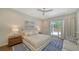 Inviting main bedroom featuring a comfortable king-size bed, stylish decor, and a relaxing atmosphere at 5856 Meriwether Pl, Sarasota, FL 34232