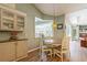 A bright breakfast nook with a large window and views, perfect for enjoying morning meals at 622 147Th E St, Bradenton, FL 34212