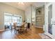 A well-lit dining area with views of the enclosed lanai, ideal for Gathering meals and gatherings at 622 147Th E St, Bradenton, FL 34212