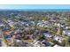 Aerial view showcases houses with vibrant landscapes and proximity to the water at 670 Venice Ln, Sarasota, FL 34242