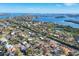 Beautiful aerial view highlights houses nestled among lush landscapes, with waterfront views at 670 Venice Ln, Sarasota, FL 34242