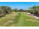 Expansive golf course featuring scenic fairways and meticulously maintained landscaping at 7261 Villa D Este Dr, Sarasota, FL 34238