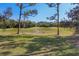 Scenic golf course view with lush green fairways and mature trees at 7261 Villa D Este Dr, Sarasota, FL 34238