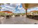 Charming outdoor dining area with comfortable seating and scenic views of the community at 7261 Villa D Este Dr, Sarasota, FL 34238