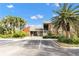 Beautifully landscaped building with ample parking and lush surroundings at 9100 Dr Martin Luther King Jr N St # 205, St Petersburg, FL 33702