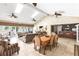 Spacious common room with dining area, bar, lounge, and plenty of natural light at 9100 Dr Martin Luther King Jr N St # 205, St Petersburg, FL 33702