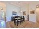 Elegant dining room with a decorative rug and a chandelier; ideal for entertaining guests at 1017 Siberian Glen, Bradenton, FL 34212