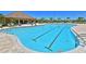 Resort-style pool featuring lap lanes, a beach entry, and a spacious pool deck with lounge chairs at 1017 Siberian Glen, Bradenton, FL 34212