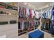 Organized walk-in closet with custom shelving and ample storage space at 1017 Siberian Glen, Bradenton, FL 34212