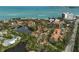 Picturesque waterfront community featuring lush greenery, a tranquil pond, and stunning coastal views at 105 Pass Key Rd # 105, Sarasota, FL 34242
