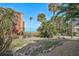 Inviting backyard with trees leading to the ocean, offering serene views and natural beauty to the property at 105 Pass Key Rd # 105, Sarasota, FL 34242