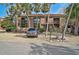 Desirable home featuring palm trees, gravel yard, and a car park offering both beauty and convenience at 105 Pass Key Rd # 105, Sarasota, FL 34242