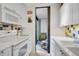 Efficient kitchen featuring white cabinets, modern appliances, and tile flooring at 105 Pass Key Rd # 105, Sarasota, FL 34242