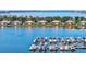 Scenic aerial view of waterfront homes with boat docks on sparkling water, perfect for boaters at 1123 Riverscape St # D, Bradenton, FL 34208