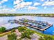 Aerial view of the community boat marina, showcasing boat slips, docks and water access at 1123 Riverscape St # D, Bradenton, FL 34208