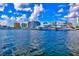 Beautiful harbor view featuring modern yachts docked in the marina against a skyline backdrop at 1123 Riverscape St # D, Bradenton, FL 34208