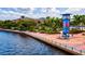 Picturesque waterfront at the Bradenton Riverwalk showcasing a scenic view with a clock tower and adjacent water at 1123 Riverscape St # D, Bradenton, FL 34208